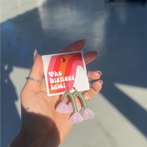 Green/purple tassel earrings